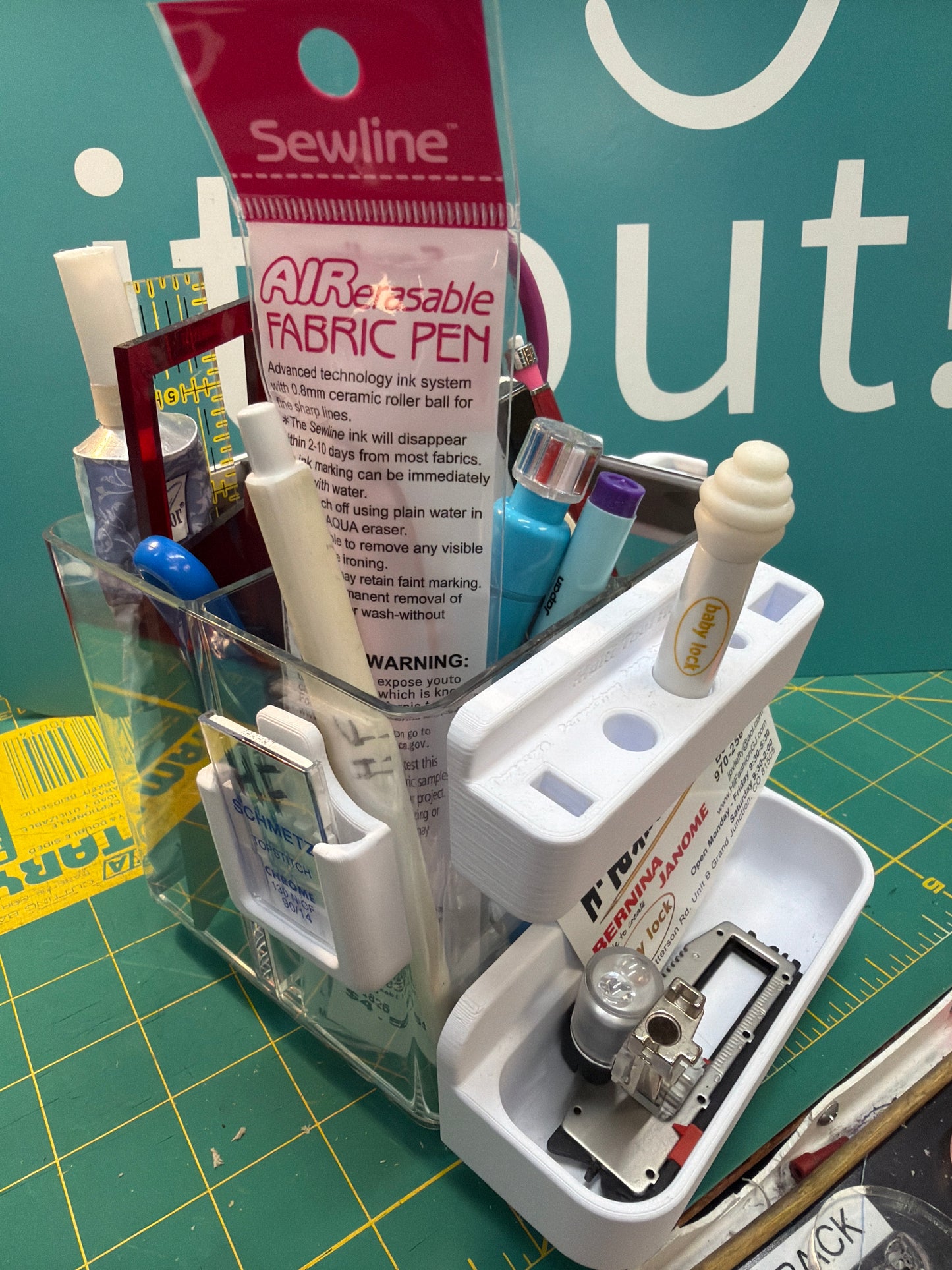 Clear spinner holds sewing tools and stick on holders