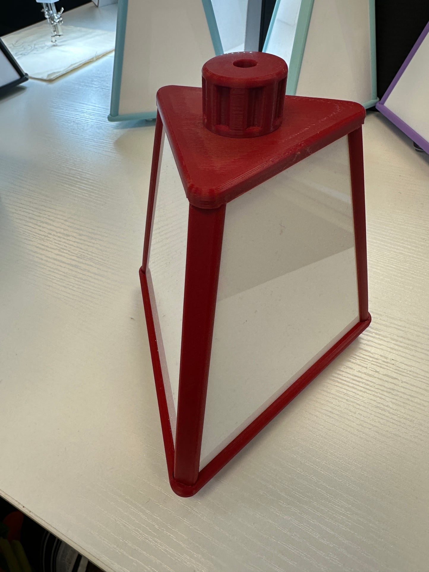 . Space saving Small spinning accessory pyramid 7” tall 6” wide Mini