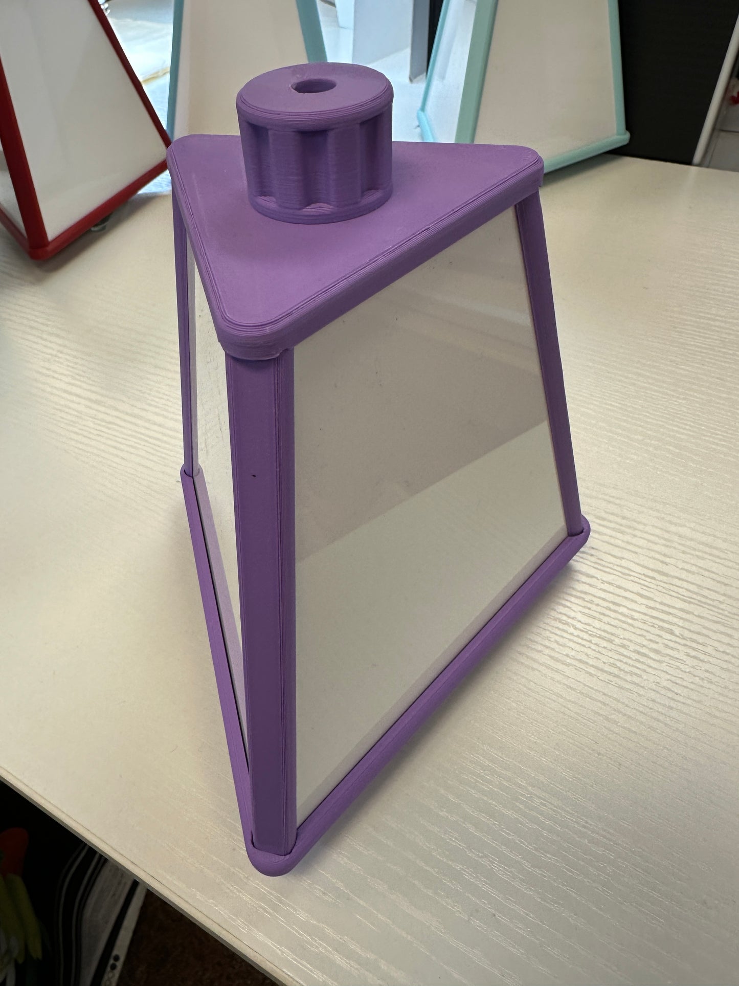 . Space saving Small spinning accessory pyramid 7” tall 6” wide Mini