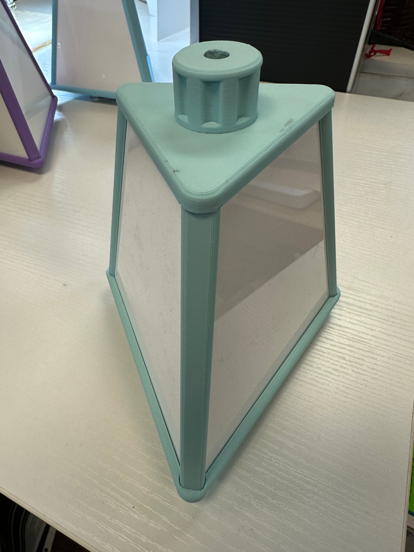 . Space saving Small spinning accessory pyramid 7” tall 6” wide Mini