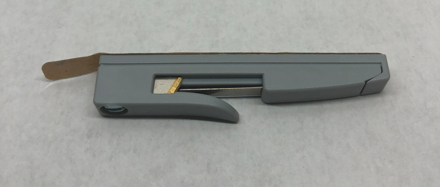 Thread holder/cutter for needle threader peal and stick application
