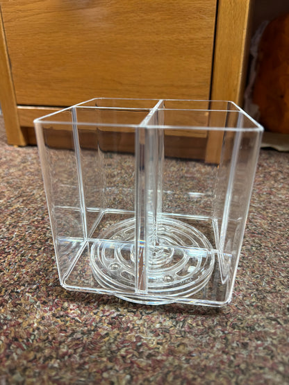 Clear spinner holds sewing tools and stick on holders