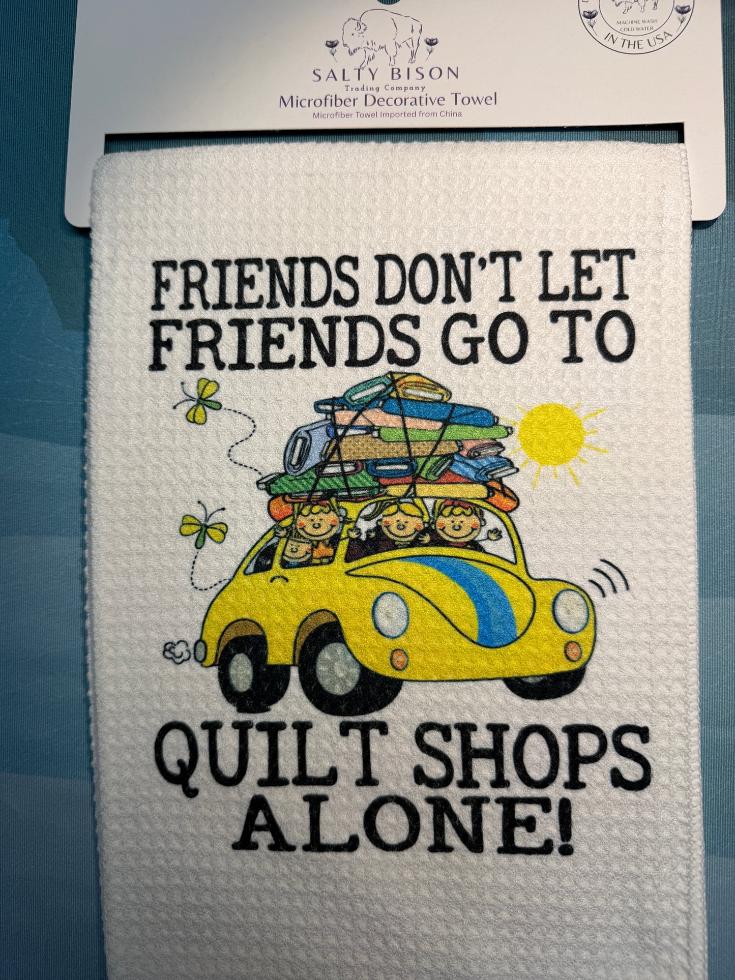 Friends don’t let friends go to quilt shops alone towel