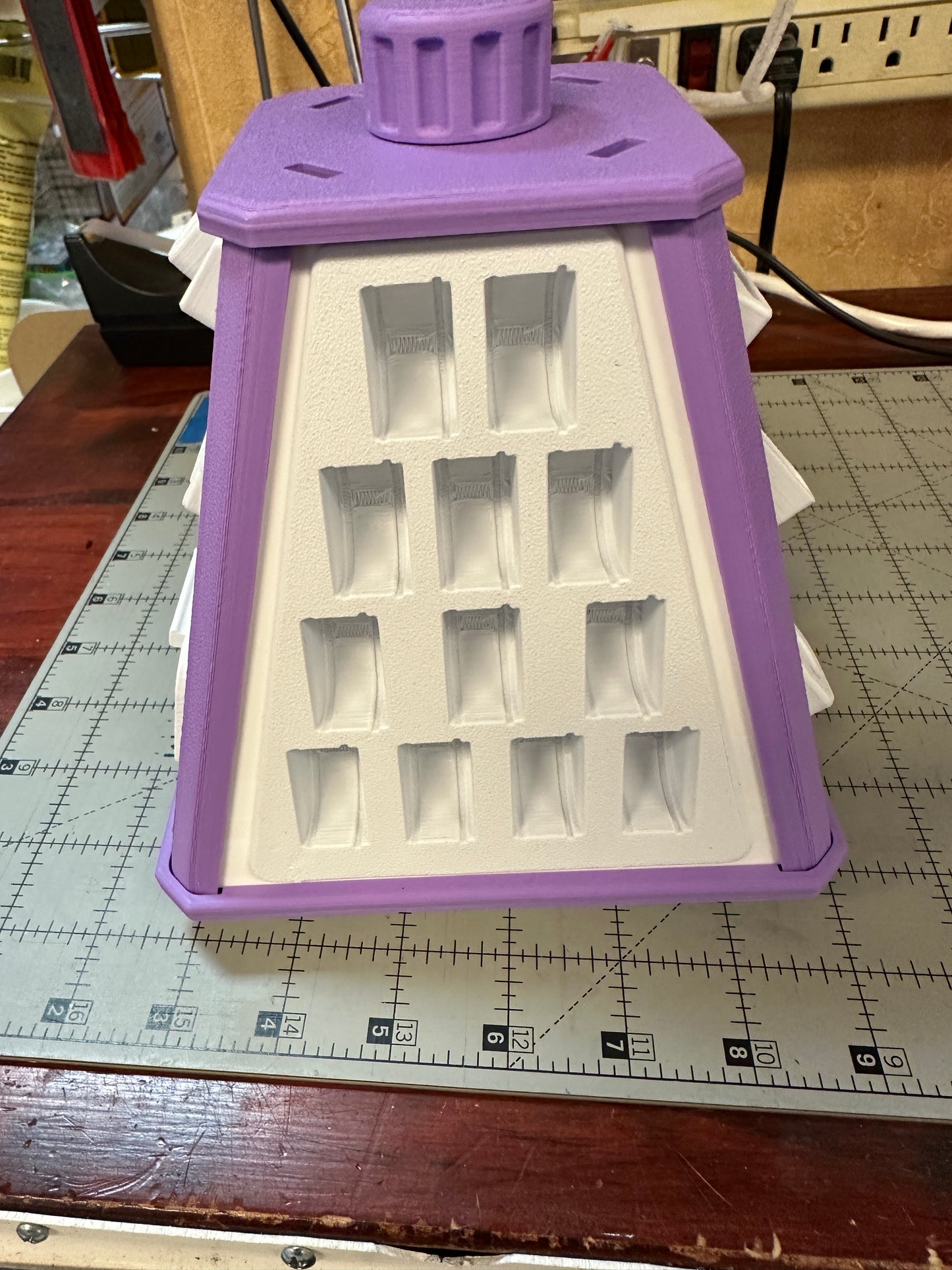 Small spinning accessory pyramid with built in holders