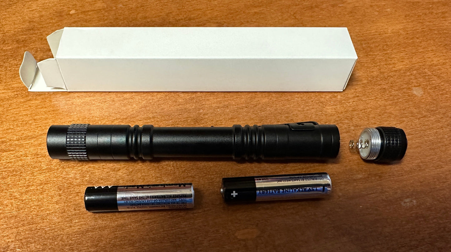 LED pen light very bright uses two AAA batteries easy push end to turn on off battery included