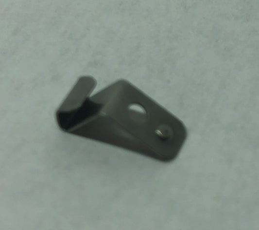 Needle plate clip replacement