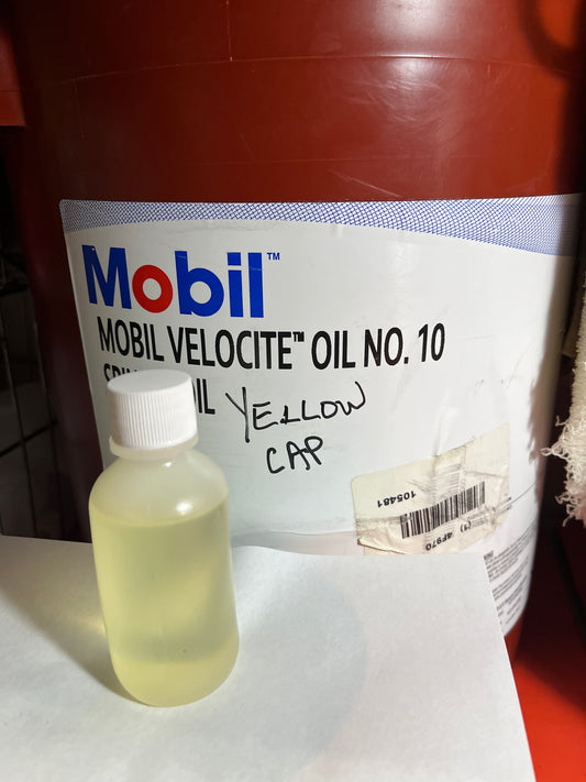 Oil refill bottle 2oz yellow cap for general maintenance